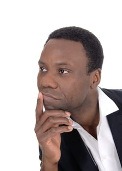 A closeup image of an African American man looking away with one.hand on his chin, isolated for white background.