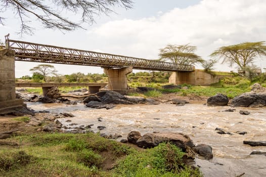 Iron Bridge on the Mara River between Maasai Mara Park in North West Kenya and Serenghetti Park in Tanzania