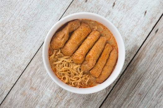 Top view Hot and spicy Malaysian Curry Noodle or laksa mee. Malaysia food.