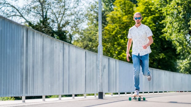 Man,27 years old,rides on longboard