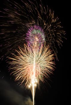 Colorful fireworks on night sky background