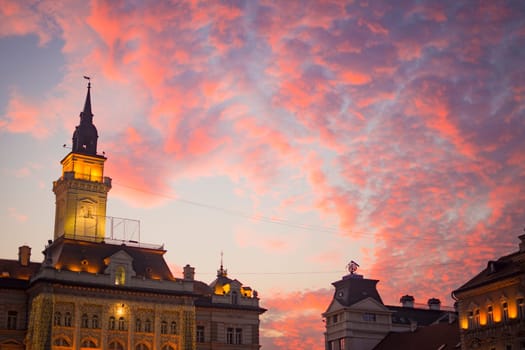 Beautiful colorful cloudy sky over buildings of Novi Sad, Serbia.