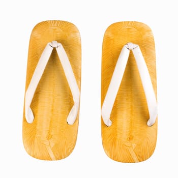 Japanese bamboo slippers isolated on white background.