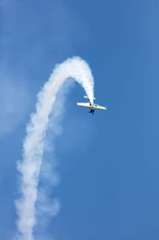 USA, Chicago - August 19: Matt Chapman performing with The Extra 330LX at Chicago Air and Water Show, with smoke to track the high flying planes on August 19, 2017