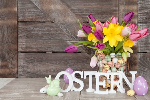 Easter bouquet with fresh tulips and daffodils