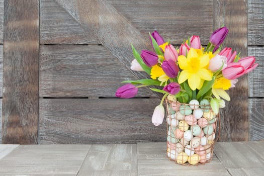 Easter bouquet with fresh tulips and daffodils