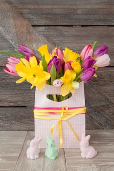 Easter bouquet with fresh tulips and daffodils