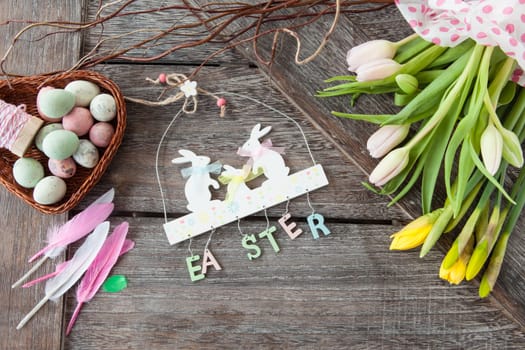 Easter decoration on a rustic wooden background