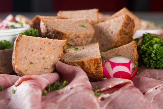 Assortment of meat delicatessen on a plate
