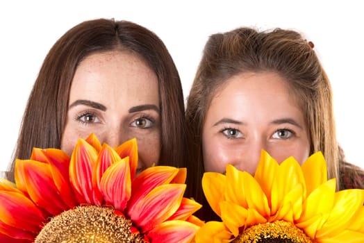 Casual young women with flowers isolated in a white background