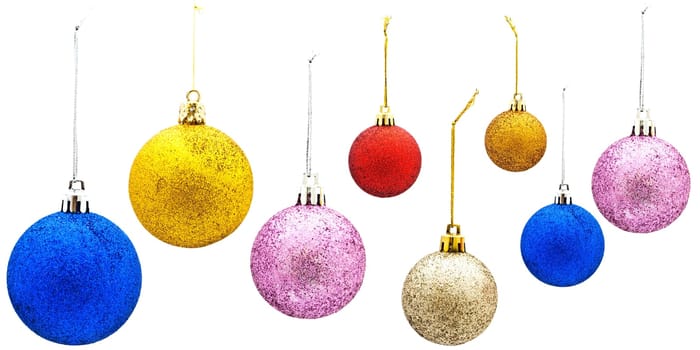 Bright Multicolored New Year Toys Against The White Background