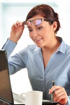 Young woman at office desk