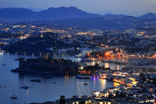 View of Bodrum harbor by night. Turkish Riviera.