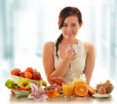Young woman having breakfast. Balanced diet