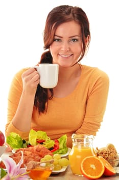 Young woman having breakfast. Balanced diet