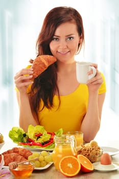 Young woman having breakfast. Balanced diet
