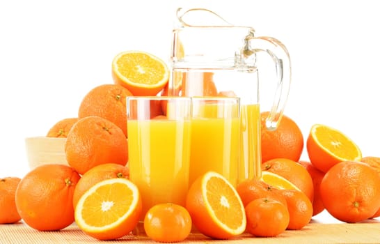 Composition with glasses of orange juice and fruits