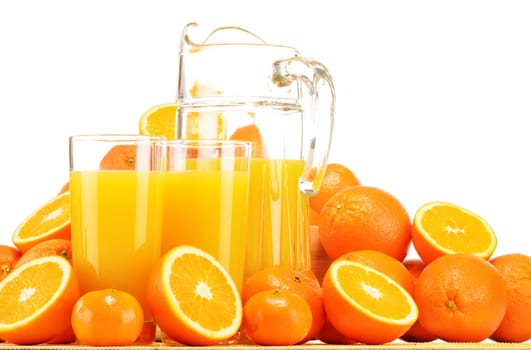 Composition with glasses of orange juice and fruits