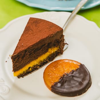 Sweet buffet delicious homemade vegan cake. Warm color. Selective focus.