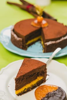 Sweet buffet delicious homemade vegan cake. Warm color. Selective focus.