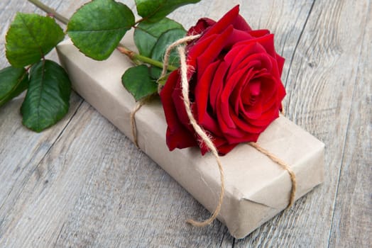 a rose and a gift for Valentine's Day