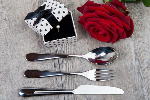 cutlery, rose and gift for Valentine's Day