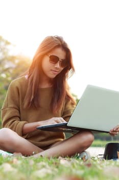 girl smile use laptop notebook computer outdoor modern lifestyle