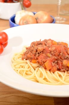 Spaghetti with bolognese on a white plate
