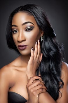 Black beautiful woman with luxurious curly hair