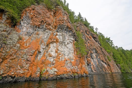 Dramatic and Colorful Cliffs in the Wilderness on Ottertrack Lake in the Boundary Waters Canoe Area in Minnesota