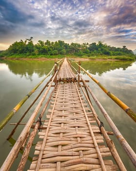 Beautiful view of a bamboo bridge. Luang Prabang. Laos landscape.