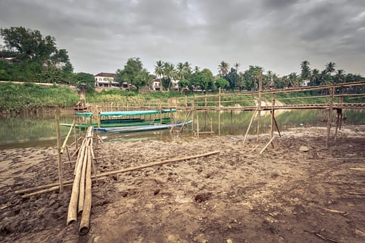 Beautiful view of a bamboo bridge. Luang Prabang. Laos landscape.