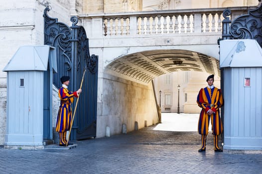 VATICAN CITY, VATICAN - May 25, 2016: Papal Swiss Guard in uniform. Currently, the name Swiss Guard generally refers to the Pontifical Swiss Guard of the Holy See stationed at the Vatican in Rome