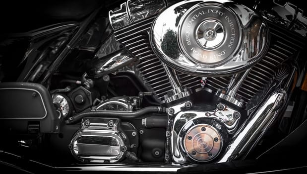 Jesolo (VE), ITALY - July 29, 2017: Motorcycle Harley Davidson. Motorcycle tank and engine's details.