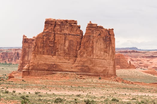 Landscape a look on the rocks of the Arches National Park. It's home to over 2,000 natural sandstone arches. In addition to a variety of unique geological resources and formations.