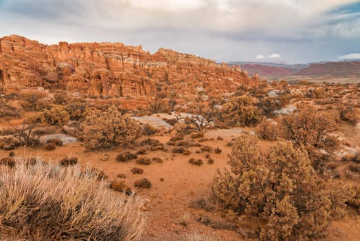 Landscape a look on the rocks of the Arches National Park. It's home to over 2,000 natural sandstone arches. In addition to a variety of unique geological resources and formations.