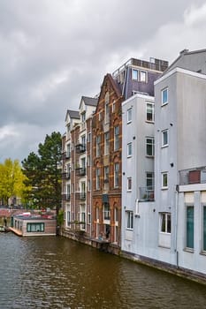 Residential Houses along One of the Canals in Amsterdam, Netherlands