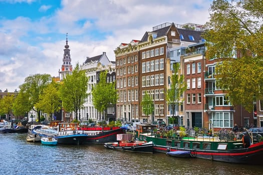 Lots of Boats on the Bank of One of Amsterdam Canals