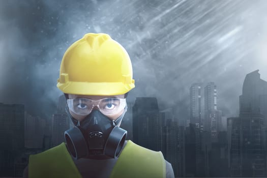 Attractive asian construction worker wearing safety protection with cityscape background