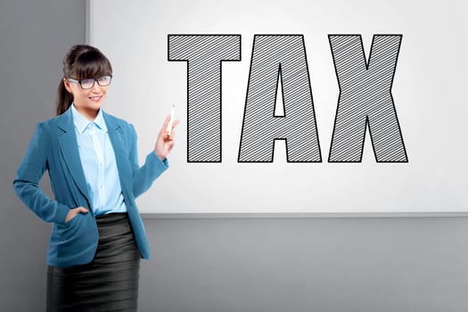 Asian business woman, writing tax on the whiteboard