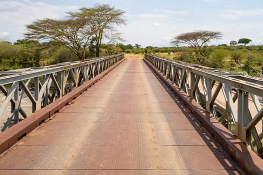 Iron Bridge on the Mara River between Maasai Mara Park in North West Kenya and Serenghetti Park in Tanzania