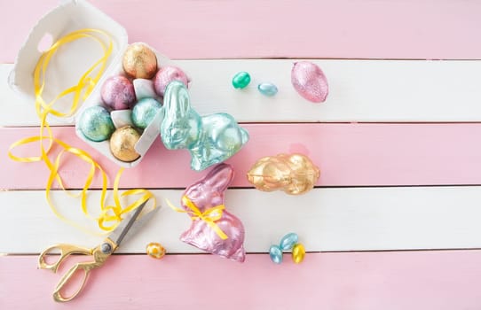 Colourful Easter bunny and chocolate Easter eggs