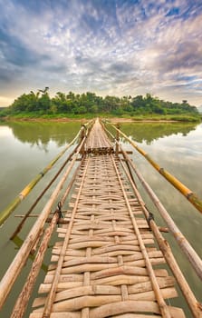 Beautiful view of a bamboo bridge. Luang Prabang. Laos landscape.