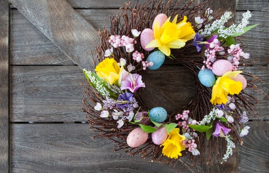 Colorful wreath of twigs and blues at Easter