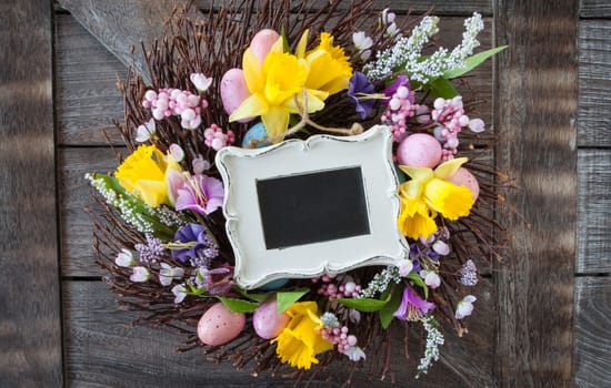 Colorful wreath of twigs and blues at Easter