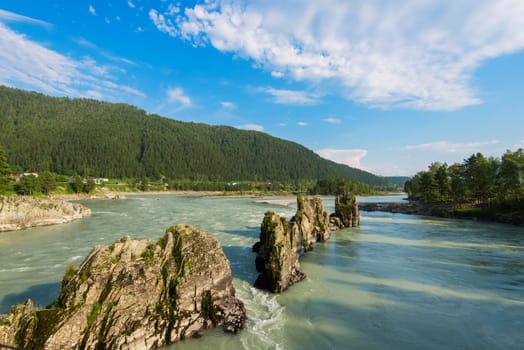 Fast mountain river Katun in Altay, Siberia, Russia. A popular tourist place called the Dragon's Teeth