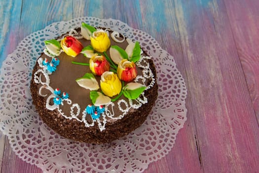 Tasty mini cake on a color gradient background
