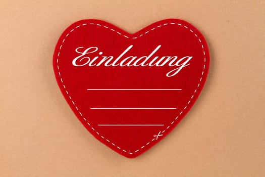Red heart made of felt with the lettering - Invitation