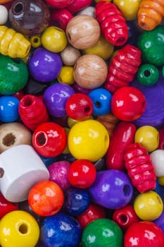 Lots of colorful wooden beads for crafting