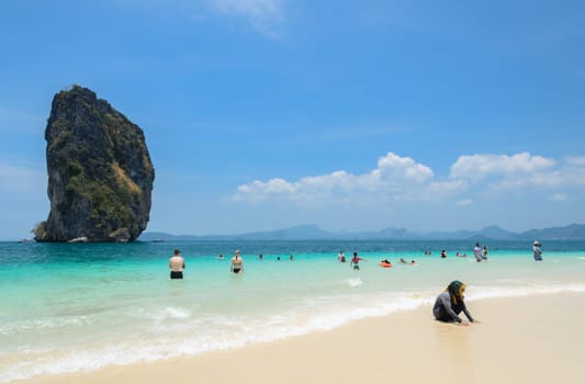 KRABI, THAILAND - APRIL 12, 2016 : Poda Island, white sandy beach with turquoise andaman sea water in Krabi province, Thailand.
